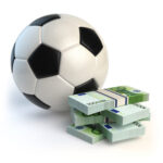 Football and stack of money