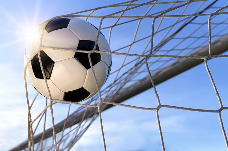 Football going into goal