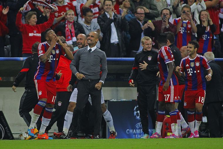 Pep Guardiola with Man City at a Champions League match