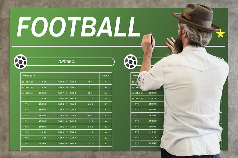 Man planning his football bets