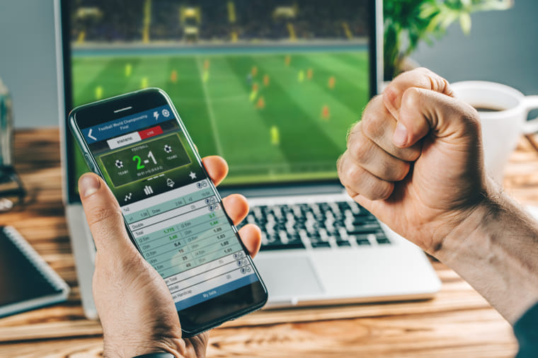 Man betting on football in play